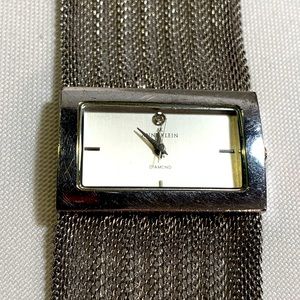 Silver weaved chain watch ban, with silver face
